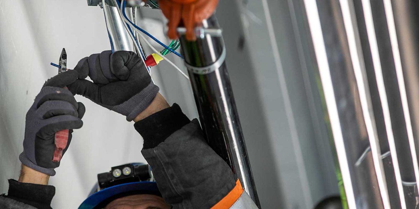 Electrician working overhead