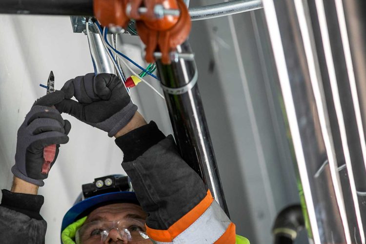 Electrician working overhead